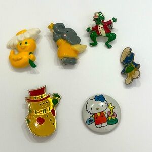 Vintage 6 Piece Lot Of Character Hat Lapel Pins 1980’s Avon Smurfs Hello Kitty